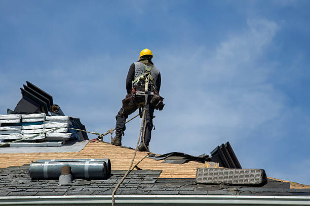 Professional Roofing technician working in Walden, NY